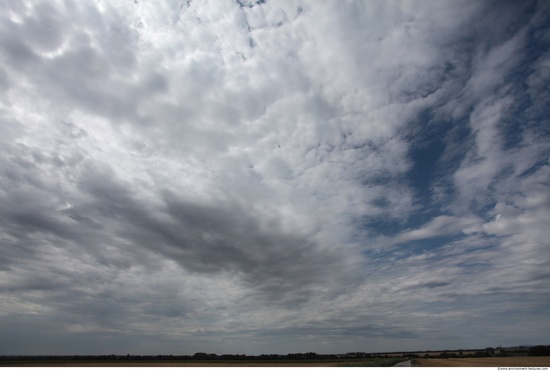 Blue Clouded Skies