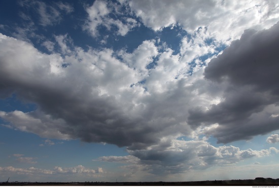 Blue Clouded Skies