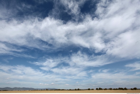 Blue Clouded Skies