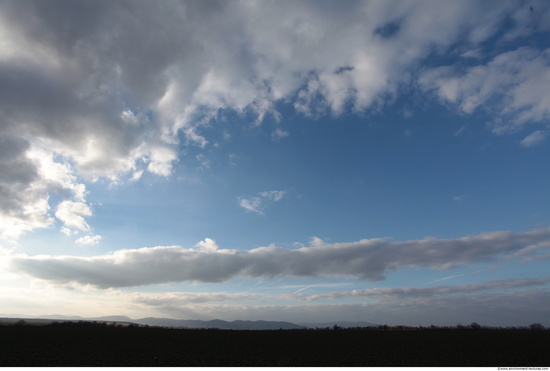 Blue Clouded Skies